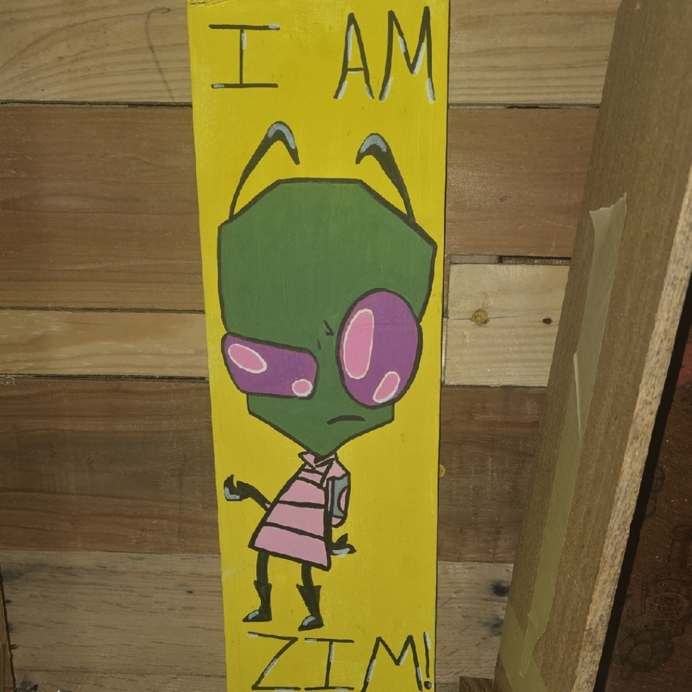 Alien Character Art on Yellow Wooden Plaque